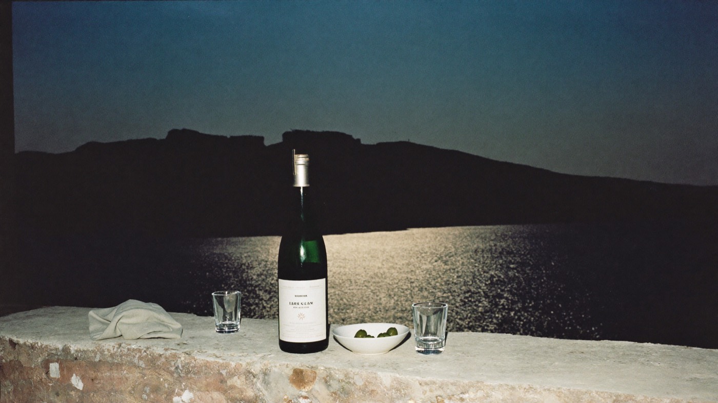 Wine on a stone wall at dusk